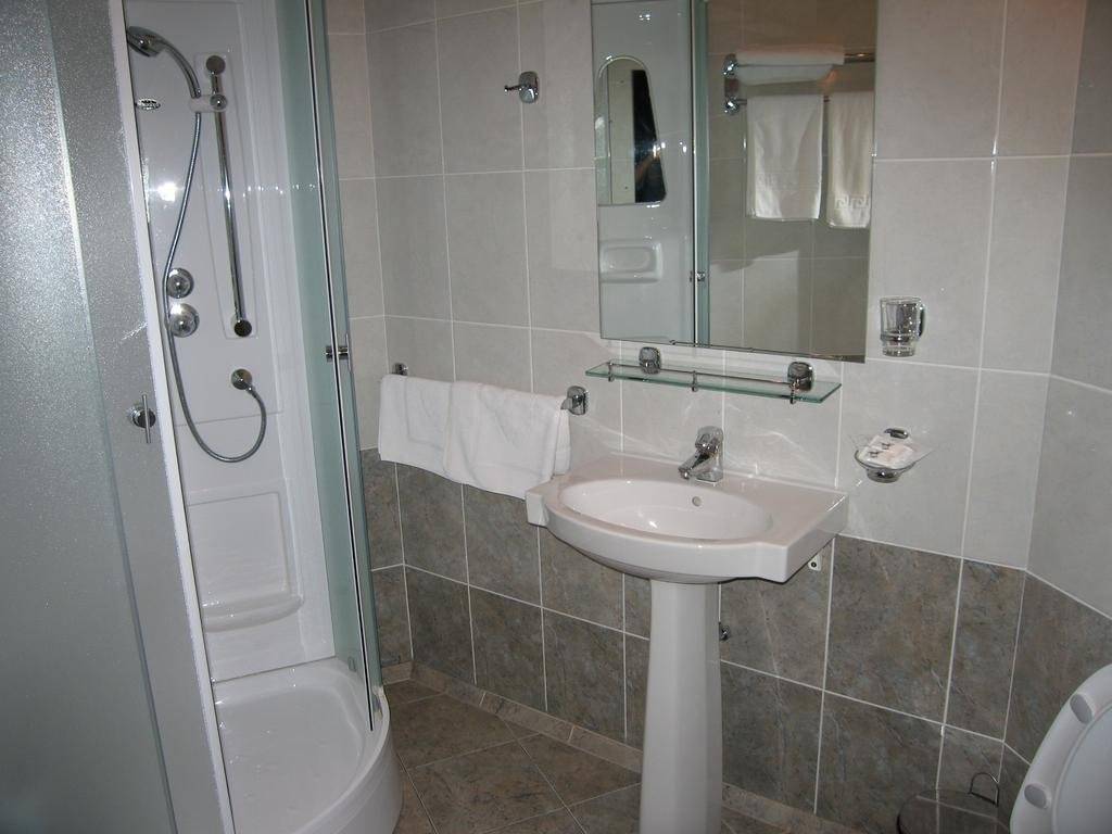 Фотографии номера Двухместный номер с 1 кроватью или 2 отдельными кроватями, вид на сад в Гостинице Тирс Отель Плешково